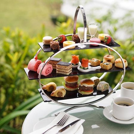 Grand Coloane Resort Makau Zewnętrze zdjęcie Afternoon tea at the InterContinental Sanctuary Cove Resort, Queensland, Australia
